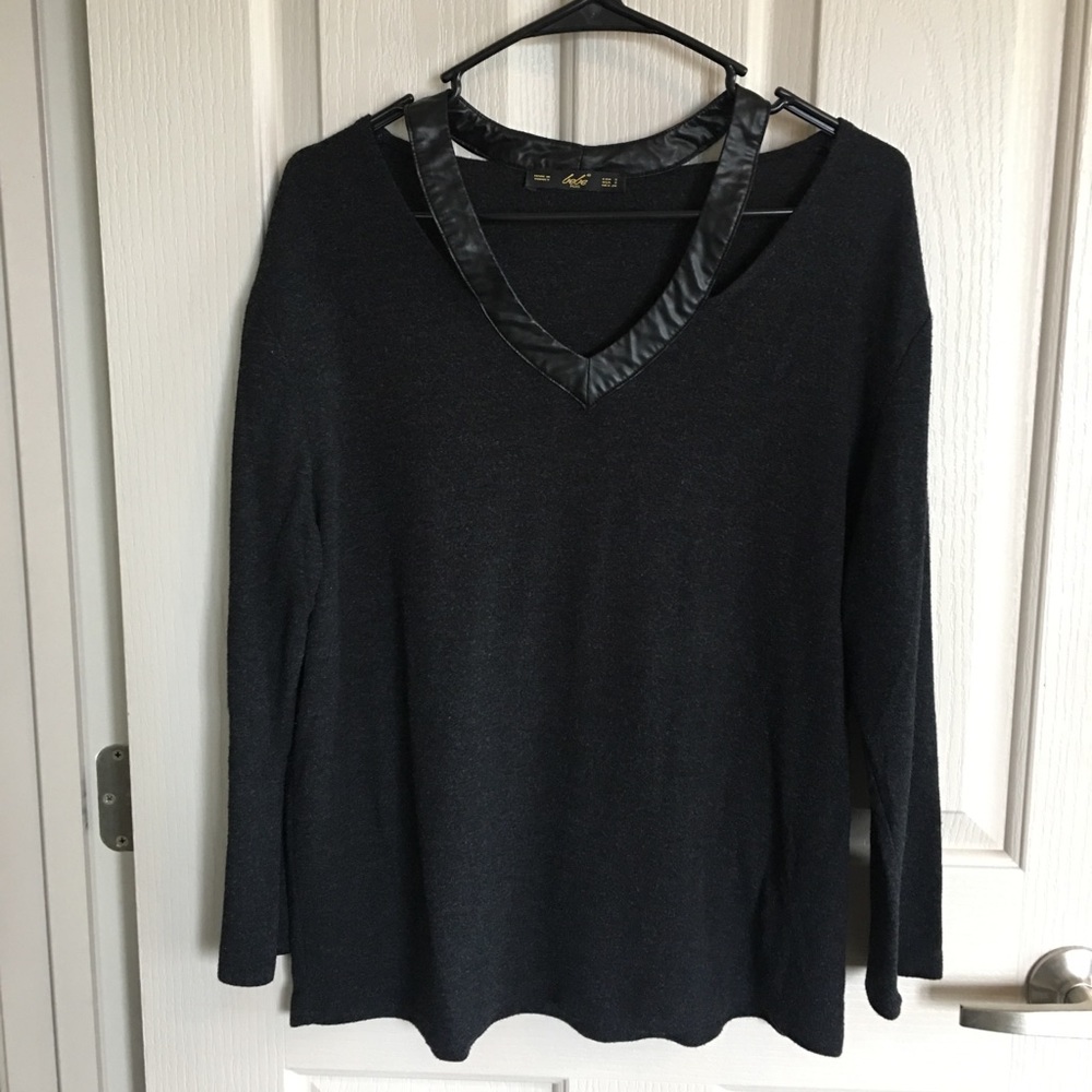 Bebe symmetric cutout neck blouse